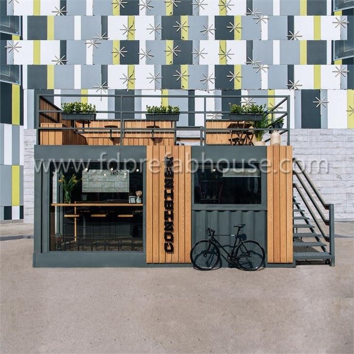 Small Black Container Cafe With Wooden Decoration