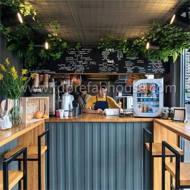 Small Black Container Cafe With Wooden Decoration